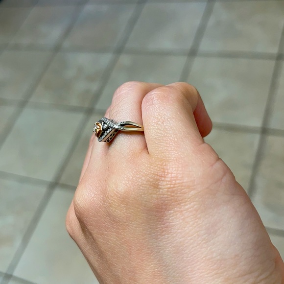 Silver ring with rose gold colored rose